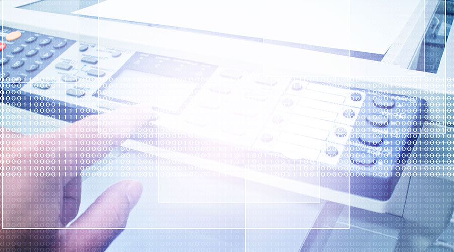 a macro image of a man using an office copier