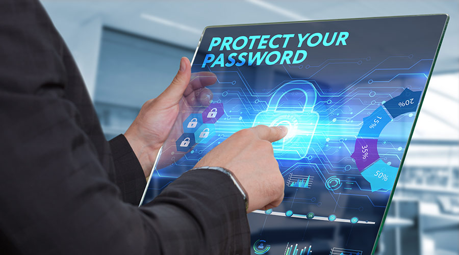 a man using tablet with a security lock on the screen to show the importance of password protection