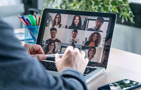 A man using a video conference software while working from home