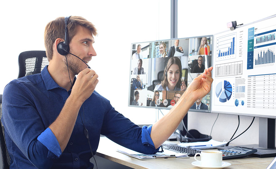 A man using video conferencing