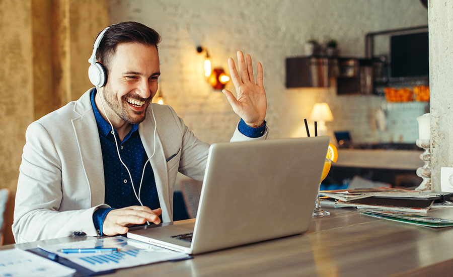 A man attending an online meeting or conference