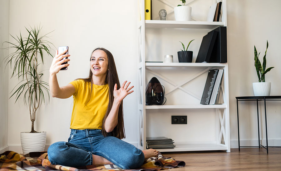 A woman engaging in a video conference