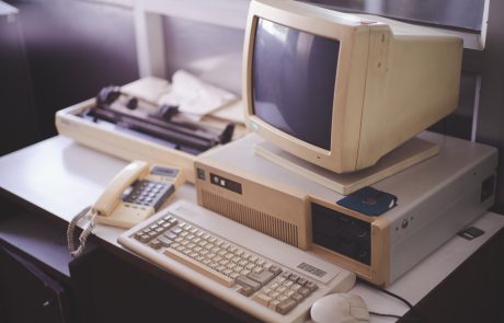 Old office and computer with obsolete technology