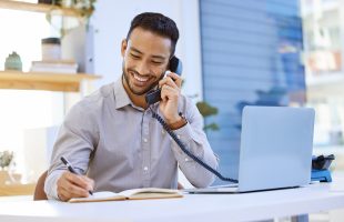Man using VoIP system