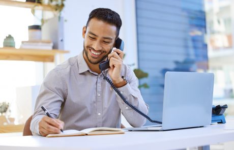 Man using VoIP system