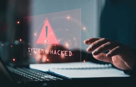 System hacked alert with computer
