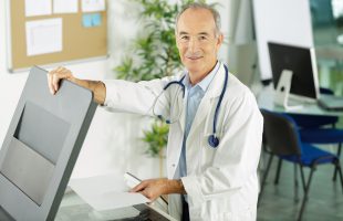 Doctor making copy of medical records