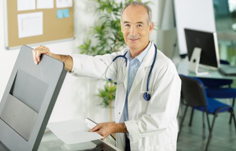Doctor making copy of medical records