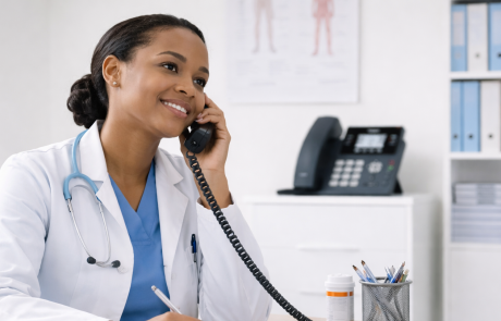 Doctor Using Modern Phone System